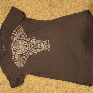 Short sleeve shirt with elephant on it